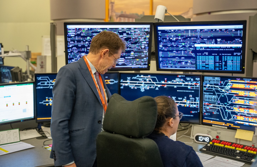 Andy Street looking at a signalling system